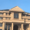 洛阳黄金麻别墅外墙干挂石材效果示例